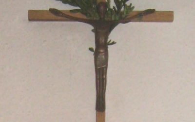 Kreuzzeichen mit Weihwasser